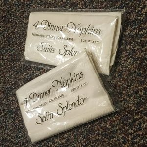 Two sets of four dinner cloth napkins
